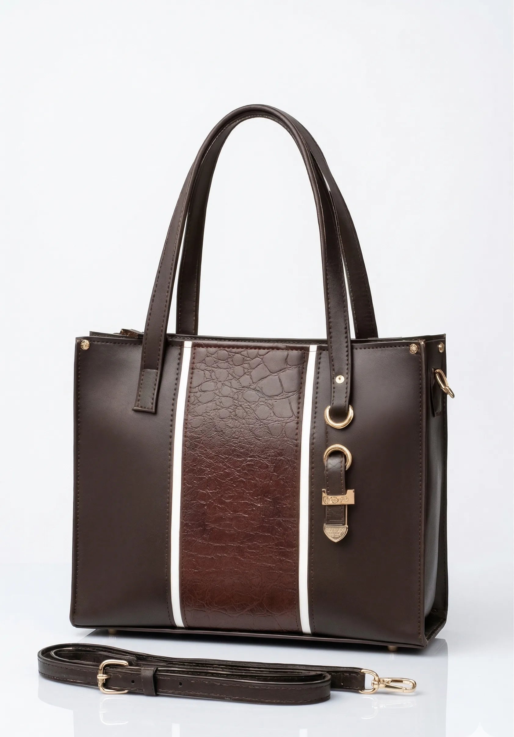 Brown leather handbag with gold accents on a white background