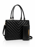 Black quilted handbag with matching wallet on a white background